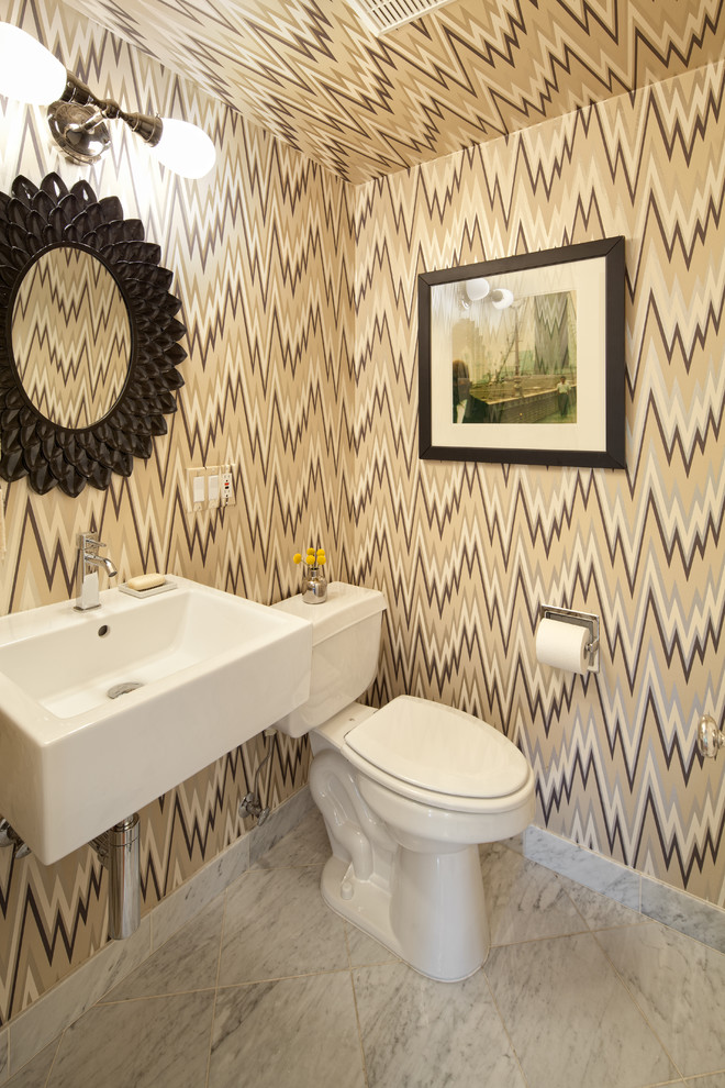 Photo of a contemporary powder room in Portland with a wall-mount sink and a two-piece toilet.