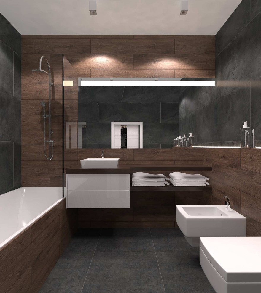 Design ideas for a mid-sized contemporary master bathroom in Other with flat-panel cabinets, white cabinets, an alcove tub, a shower/bathtub combo, a wall-mount toilet, black tile, porcelain tile, brown walls, porcelain floors, a wall-mount sink, granite benchtops, grey floor, a sliding shower screen, brown benchtops, an enclosed toilet, a double vanity, a floating vanity, panelled walls and recessed.