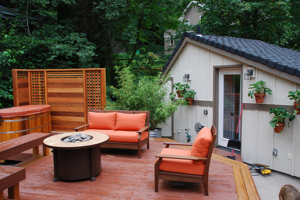 Photo of a traditional rooftop and rooftop deck in Portland with a fire feature and no cover.