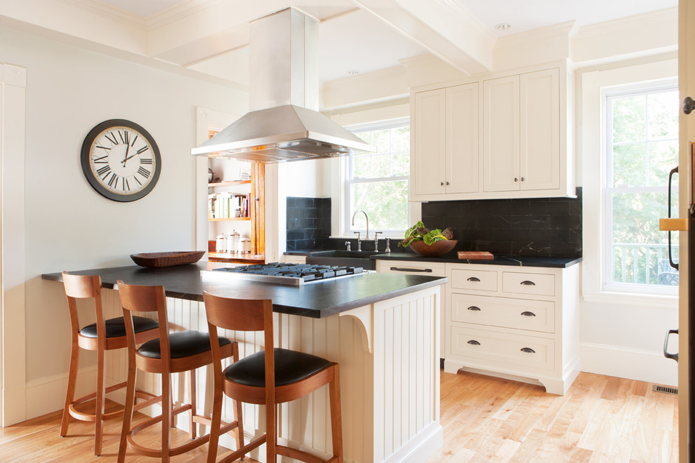 Design ideas for a traditional kitchen in Boston with soapstone benchtops and stone tile splashback.