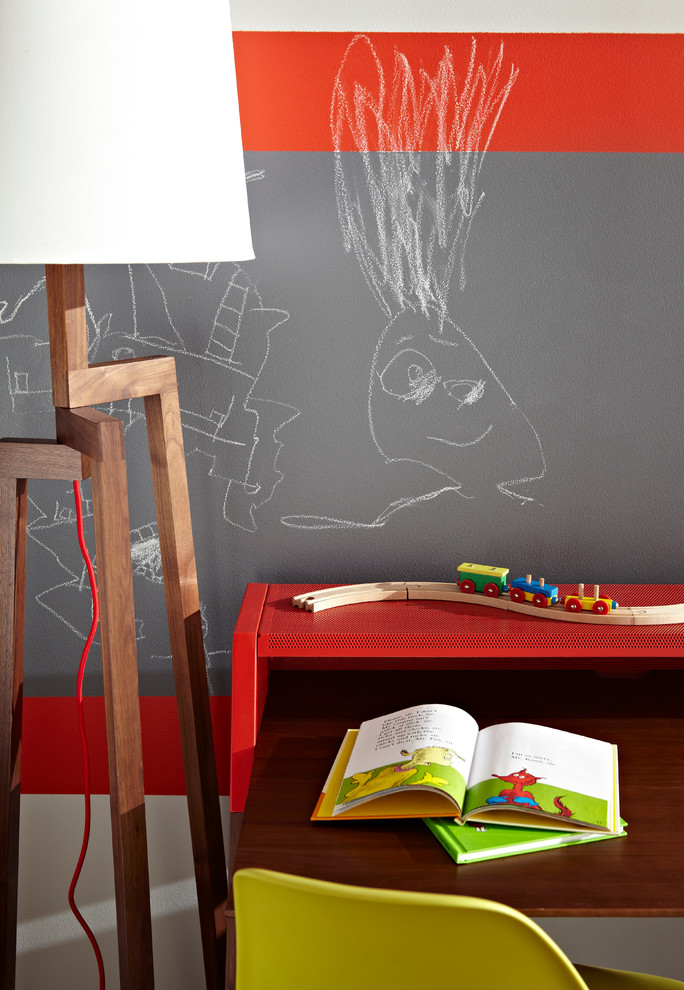 Inspiration for a mid-sized contemporary kids' study room for kids 4-10 years old and boys in New York with white walls and dark hardwood floors.