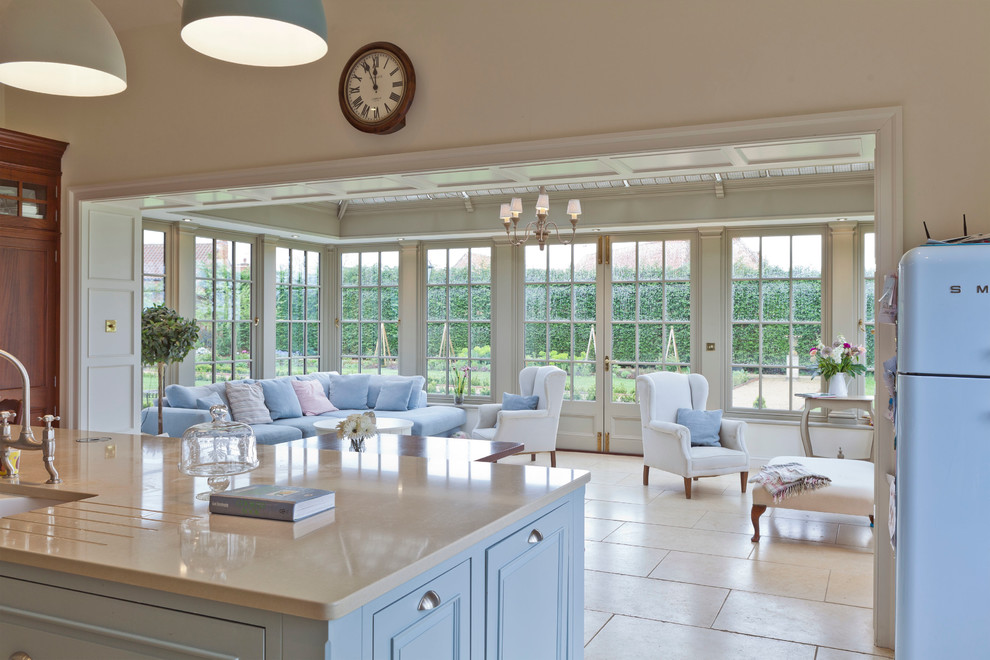 This is an example of a large traditional sunroom in Other.
