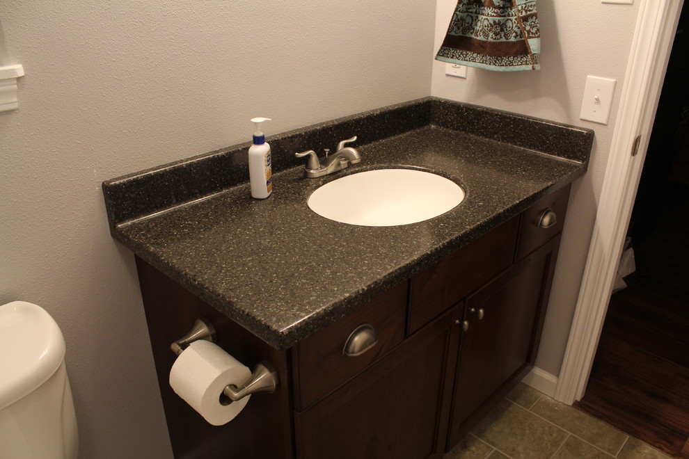 Bathroom - traditional bathroom idea with an integrated sink and solid surface countertops