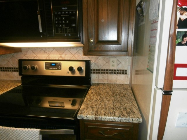 St Cecilia Granite On Dark Cabinets Traditional Kitchen