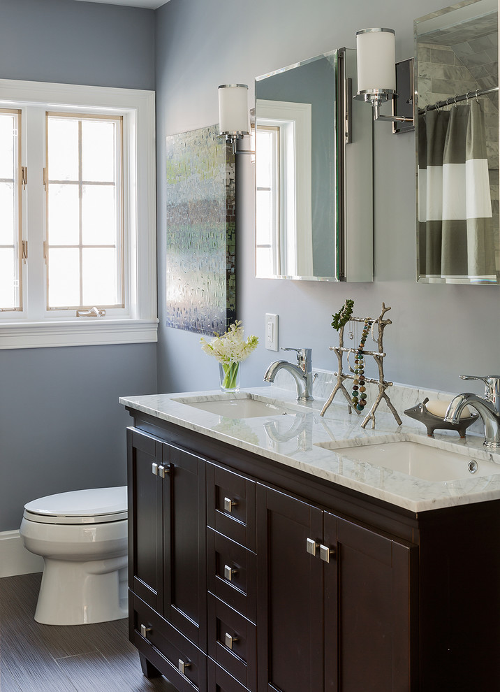 Design ideas for a mid-sized traditional bathroom in Boston with an undermount sink, shaker cabinets and dark wood cabinets.