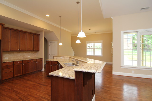 Angled island layout - Traditional - Kitchen - Raleigh - by Stanton Homes