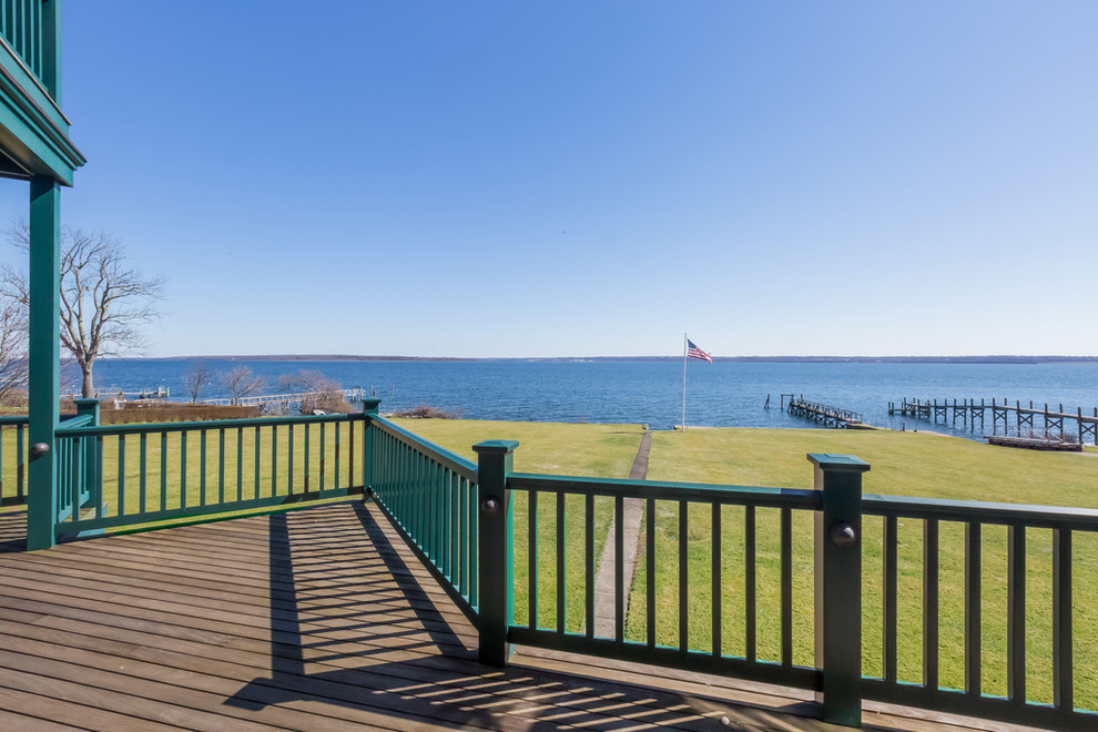 Deck - huge craftsman backyard deck idea in Providence with no cover