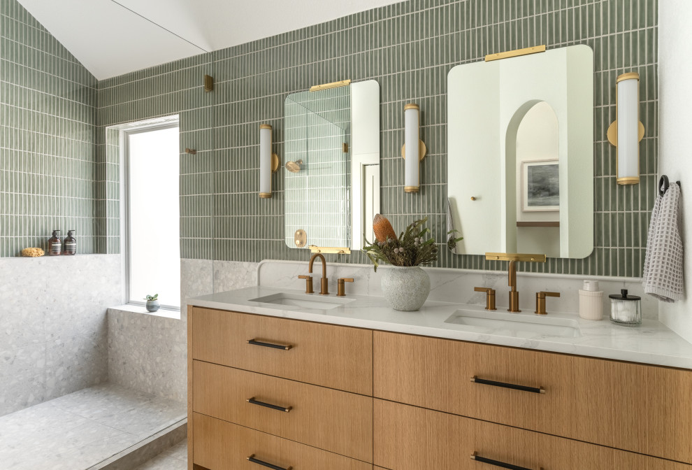 Trendy master green tile and ceramic tile terrazzo floor, gray floor and double-sink bathroom photo in Austin with medium tone wood cabinets, white walls, an undermount sink, quartz countertops, a hinged shower door, white countertops and a freestanding vanity