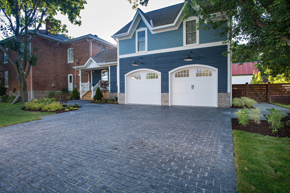 Photo of a transitional brick garden path in Toronto.