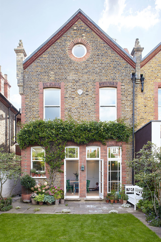 Photo of a transitional home design in London.
