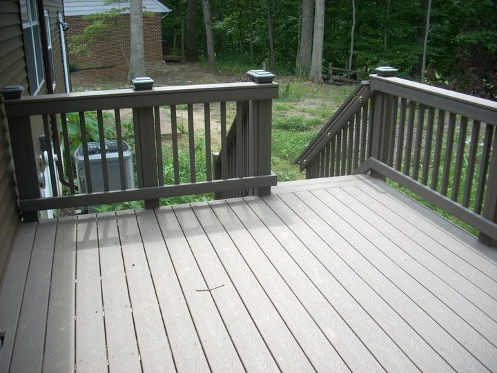 Mid-sized backyard deck photo in DC Metro with no cover
