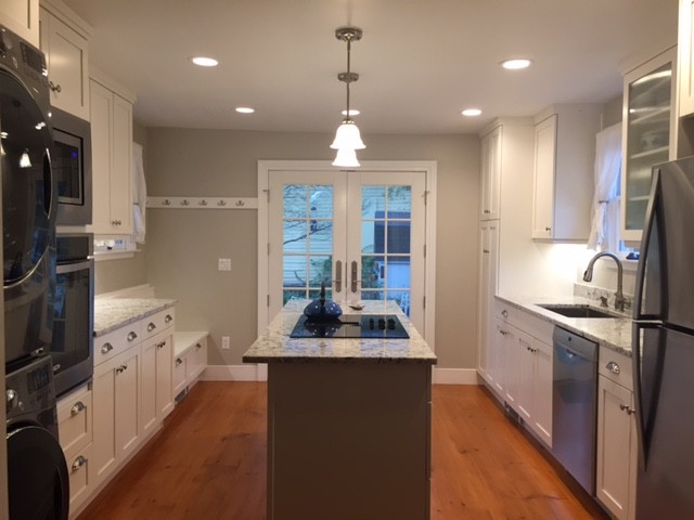 Example of a transitional kitchen design in New York
