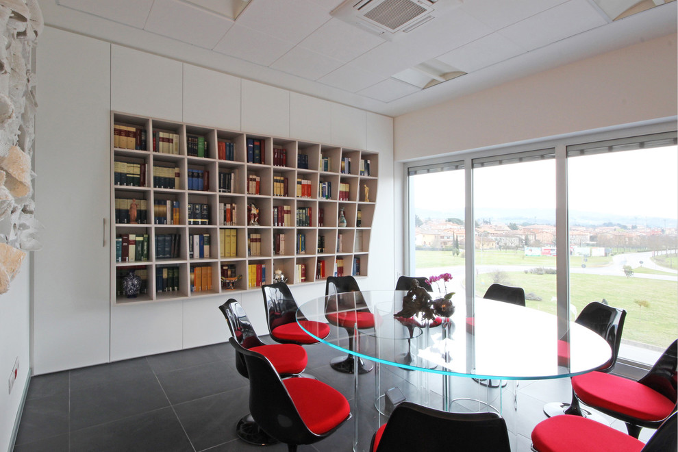 Large contemporary study room in Other with white walls, concrete floors, black floor and a freestanding desk.
