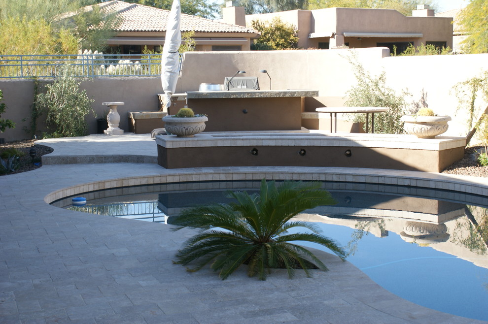 New Pool, After photo with new travertine decks, new  fire pit with carved Cante