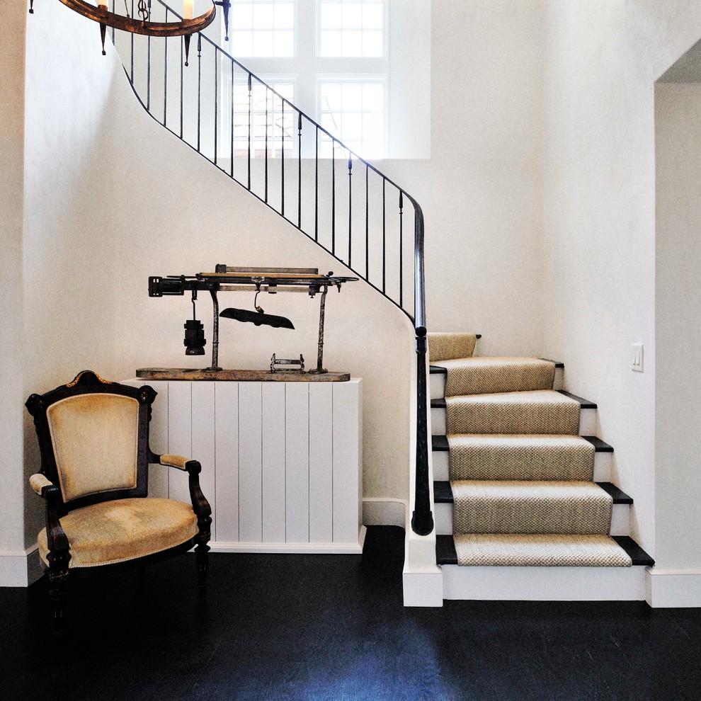 Photo of a traditional staircase in Atlanta with metal railing.
