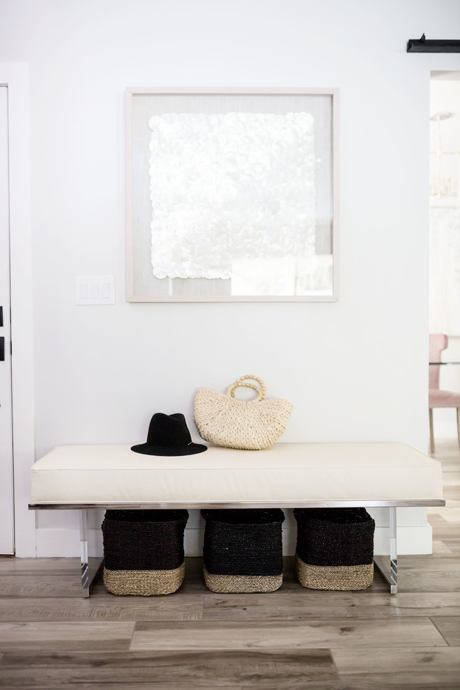 Inspiration for a mid-sized transitional porcelain tile and gray floor mudroom remodel in Phoenix with white walls and a white front door