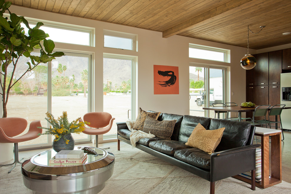 Inspiration for a transitional open concept living room in Los Angeles with white walls.