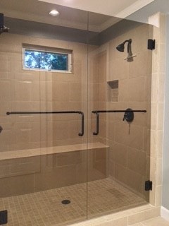 Inspiration for a large timeless master marble tile alcove bathtub remodel in Raleigh with a hinged shower door