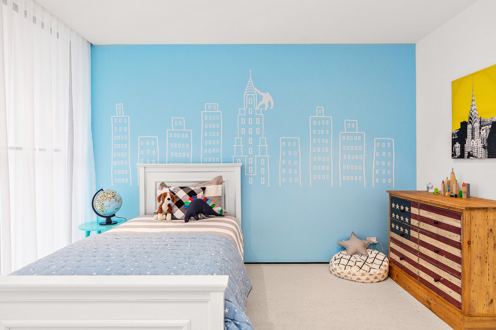 Design ideas for a mid-sized transitional kids' bedroom for kids 4-10 years old and boys in Melbourne with white walls, carpet and white floor.