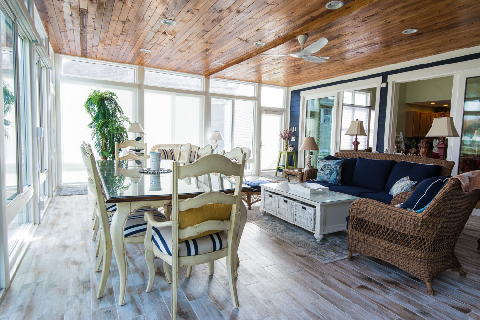 Large beach style sunroom in Other.