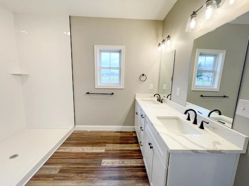 This is an example of an arts and crafts bathroom in Other with shaker cabinets, white cabinets, white tile, subway tile, engineered quartz benchtops, brown floor, a shower curtain, white benchtops, a built-in vanity and a double vanity.