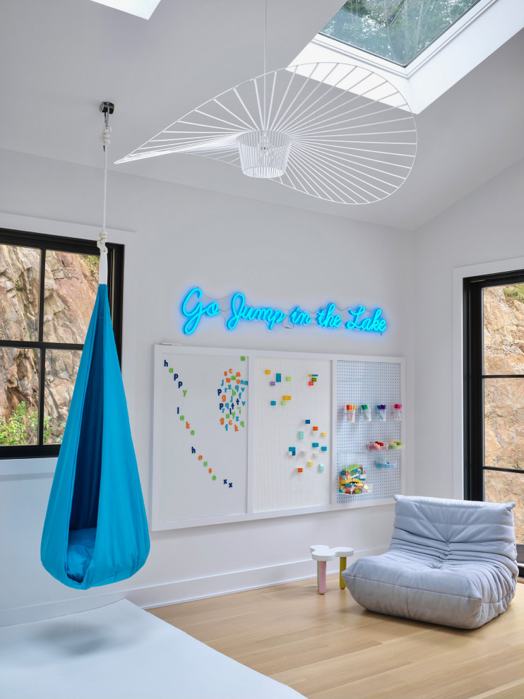 Design ideas for a beach style kids' bedroom in New York.