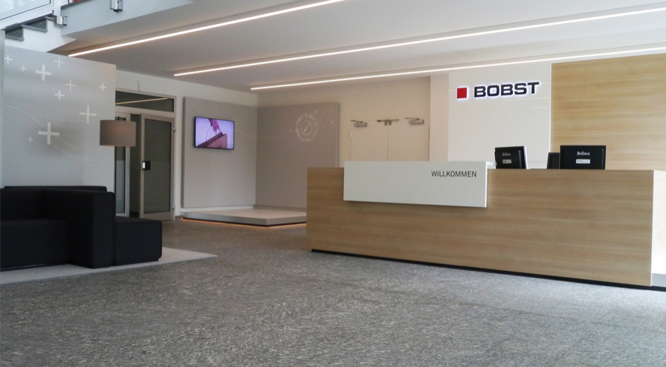 Bobst Eingang Empfang Office Büro Planung Präsentation Umplanung Modernisierung Interior Design NRW Krefeld Meerbusch Architektur Innenarchitektur Gestaltung 3D Beleuchtung Eindruck Theke Sekretariat