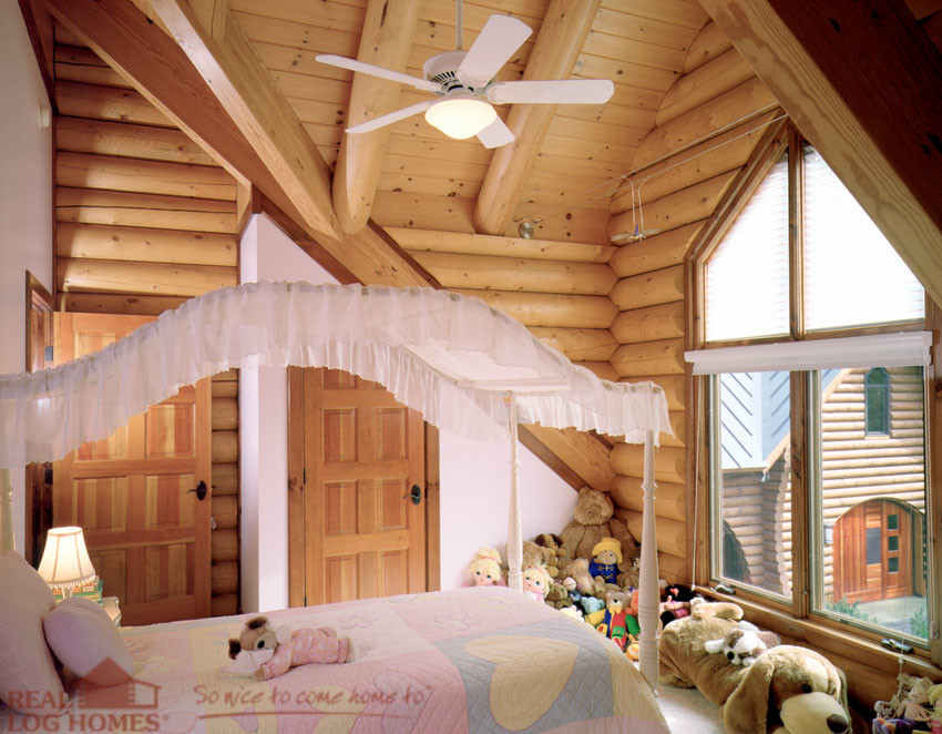 Country kids' bedroom in Burlington with beige walls and carpet for girls.