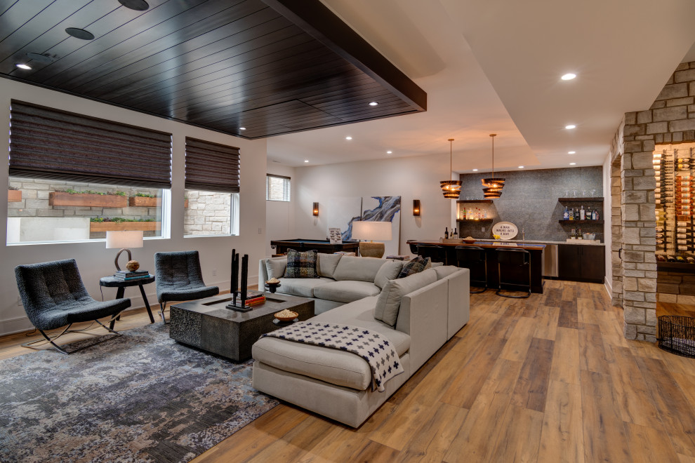 This is an example of a large contemporary basement in Austin.