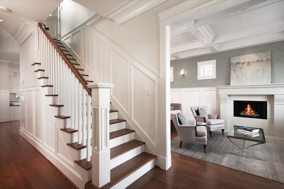 Inspiration for a large arts and crafts foyer in Vancouver with grey walls, medium hardwood floors, a single front door and a black front door.