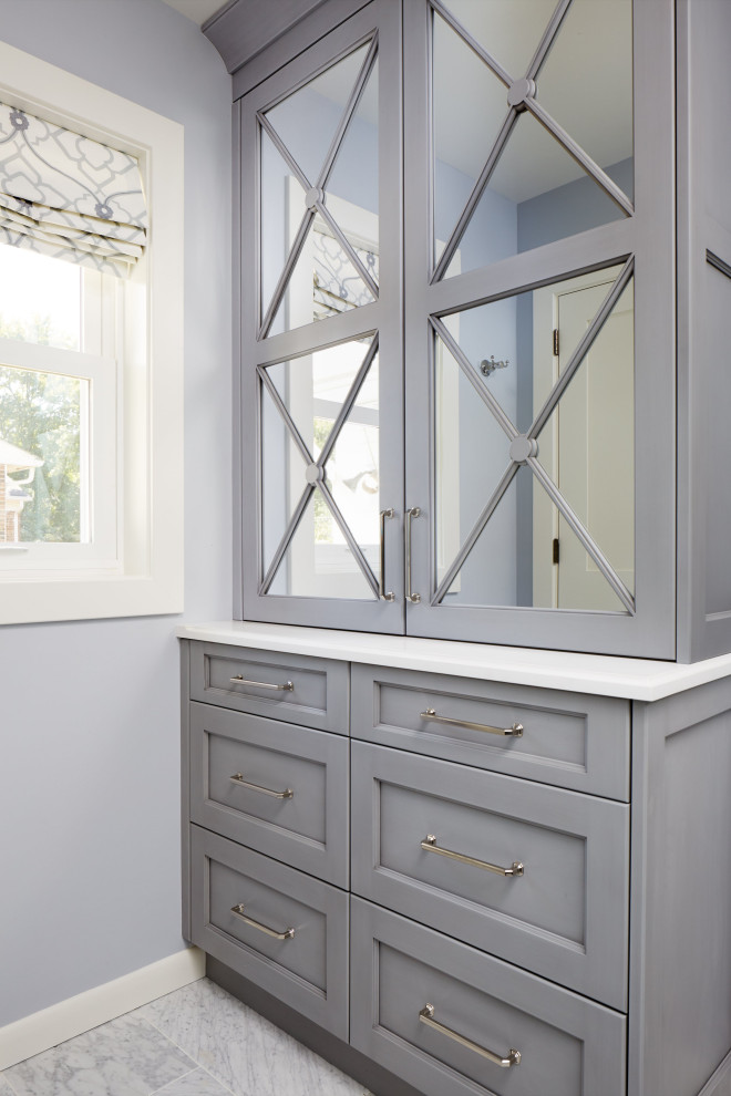 #mcleanrenovation - Master Bathroom Built In Storage - Relaxing white and gray master bathroom with marble tiles and built-in storage

Photo by Stacy Zarin Goldberg Photography
