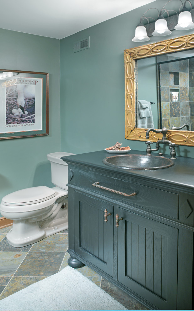 Mid-sized transitional 3/4 multicolored tile and stone tile slate floor alcove shower photo in Columbus with a drop-in sink, furniture-like cabinets, gray cabinets, a two-piece toilet and green walls