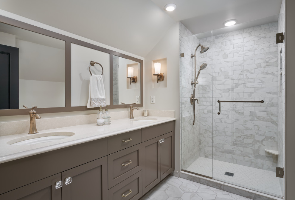 This is an example of a transitional master bathroom in Minneapolis with shaker cabinets, grey cabinets, an alcove shower, gray tile, white walls, an undermount sink, grey floor, a hinged shower door, beige benchtops, a double vanity and a built-in vanity.