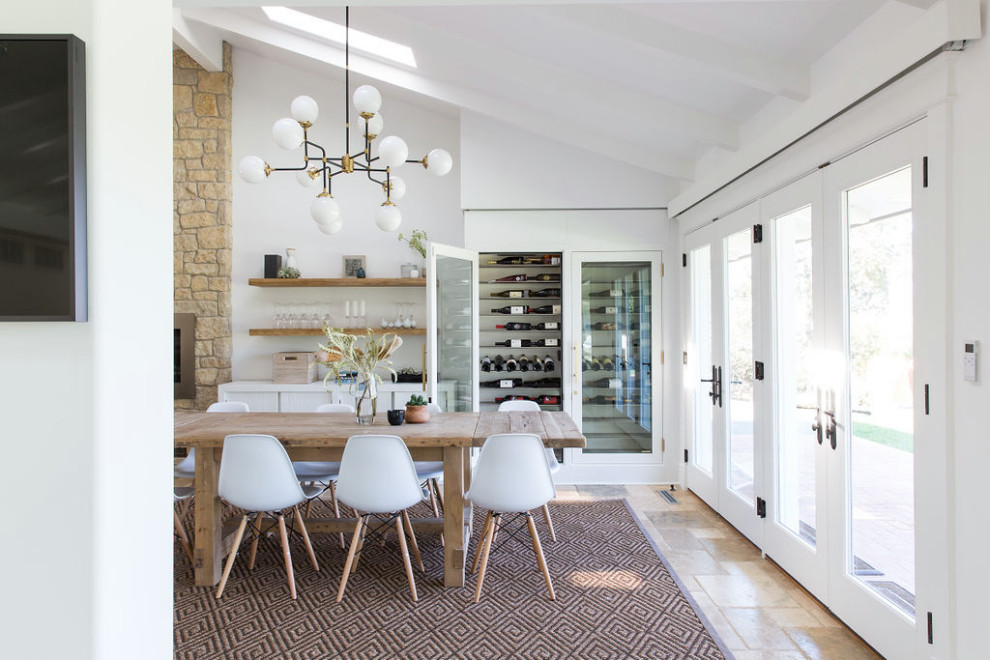Inspiration for a contemporary dining room in San Francisco with travertine floors.