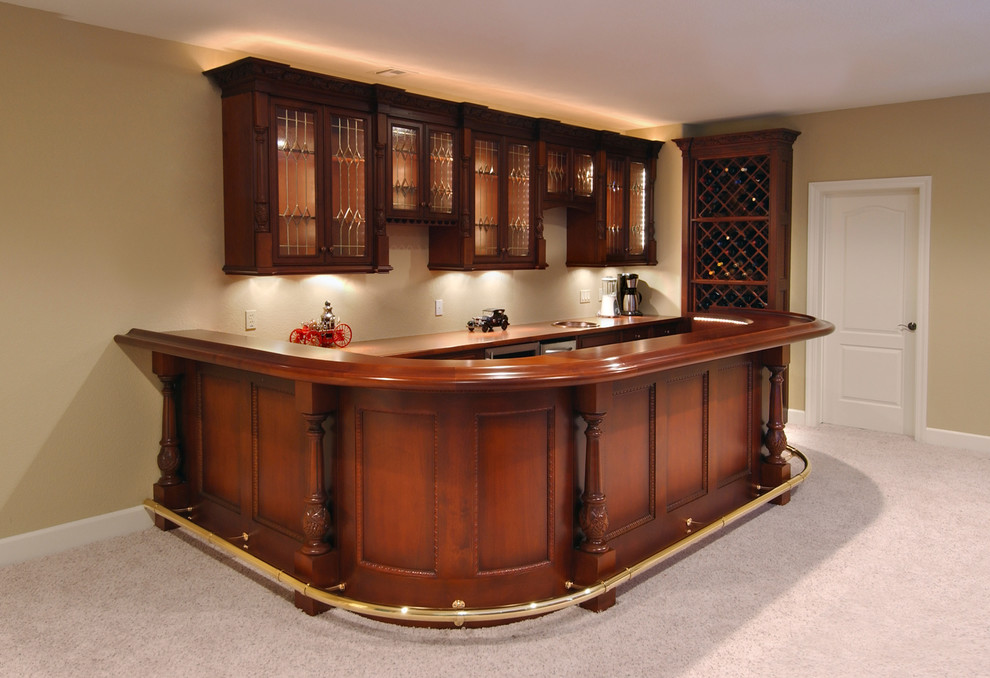 Inspiration for a large traditional home bar in Other.