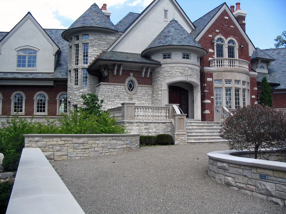 Traditional exterior in Detroit with stone veneer.