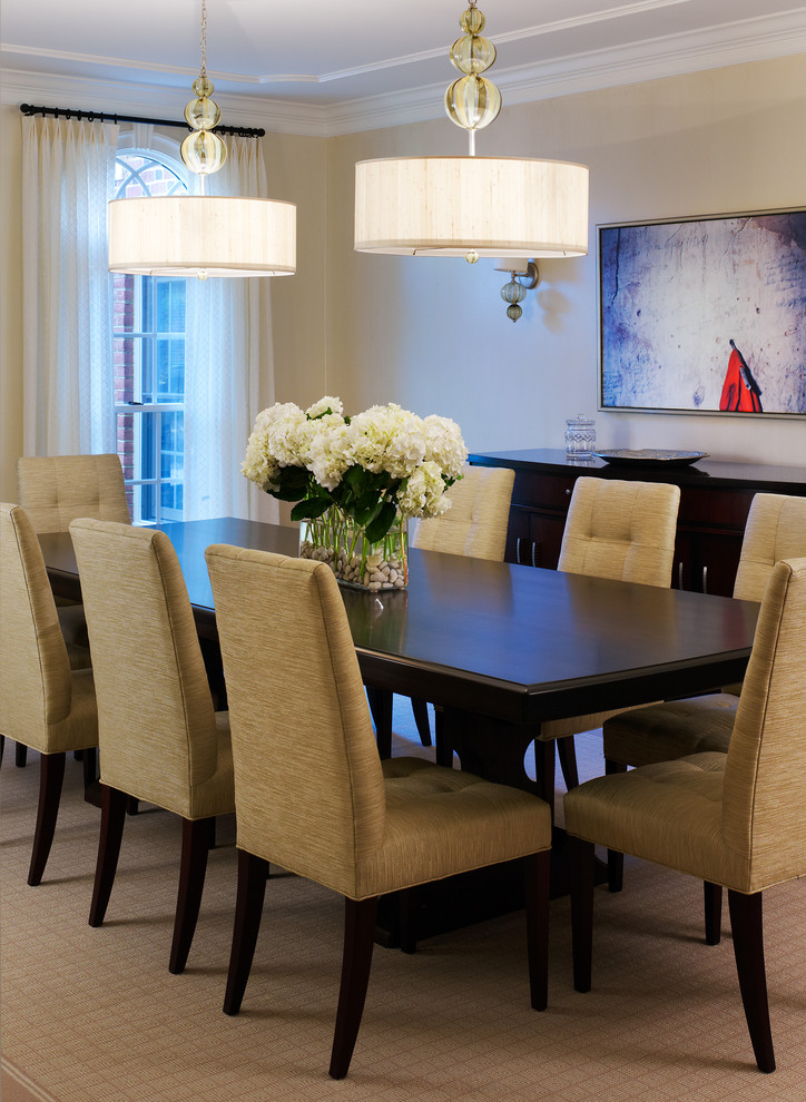 Design ideas for a transitional dining room in DC Metro with beige walls and beige floor.
