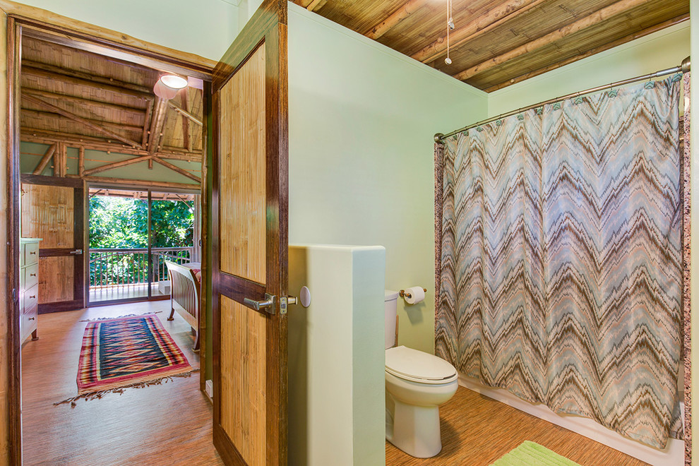Photo of a tropical bathroom in Hawaii with bamboo floors.