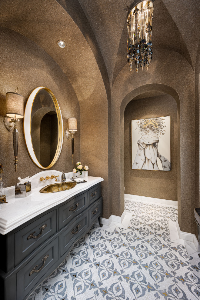 Powder room in Phoenix with raised-panel cabinets, black cabinets, mosaic tile floors, marble benchtops, a built-in vanity, vaulted and wallpaper.