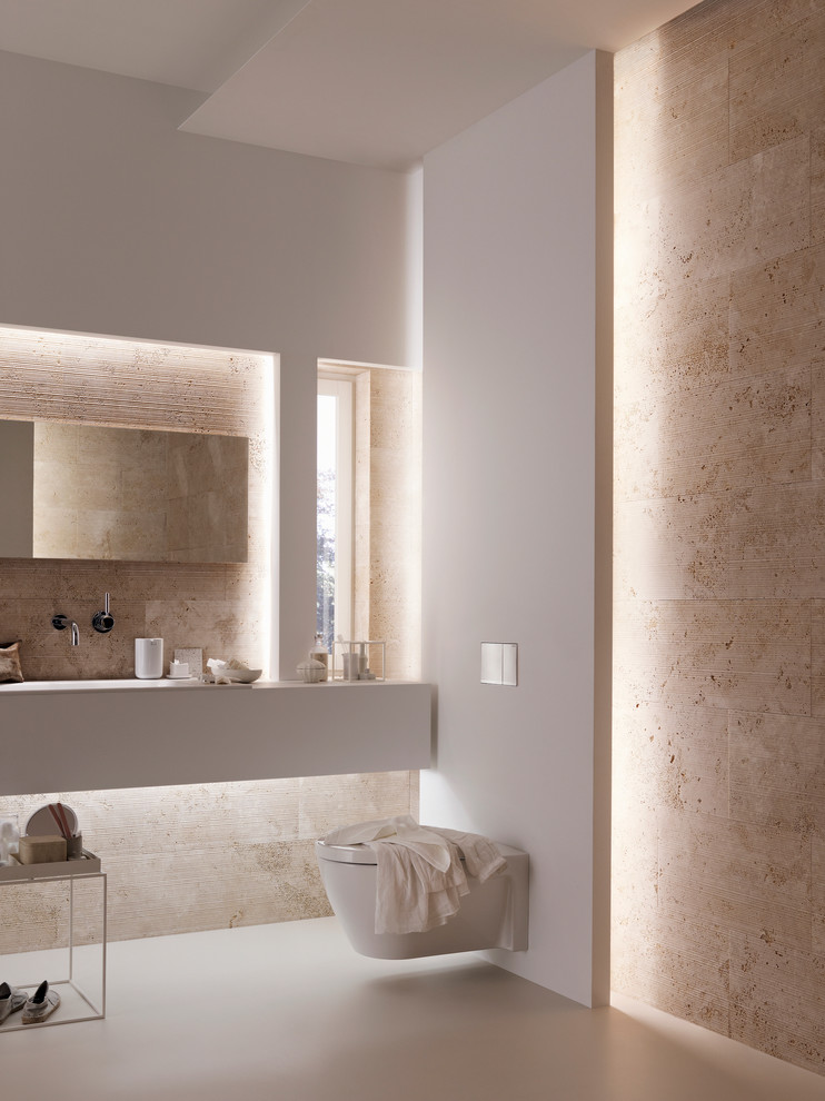 Inspiration for a mid-sized contemporary master brown tile and stone tile bathroom remodel in Chicago with a drop-in sink, a wall-mount toilet, multicolored walls and solid surface countertops