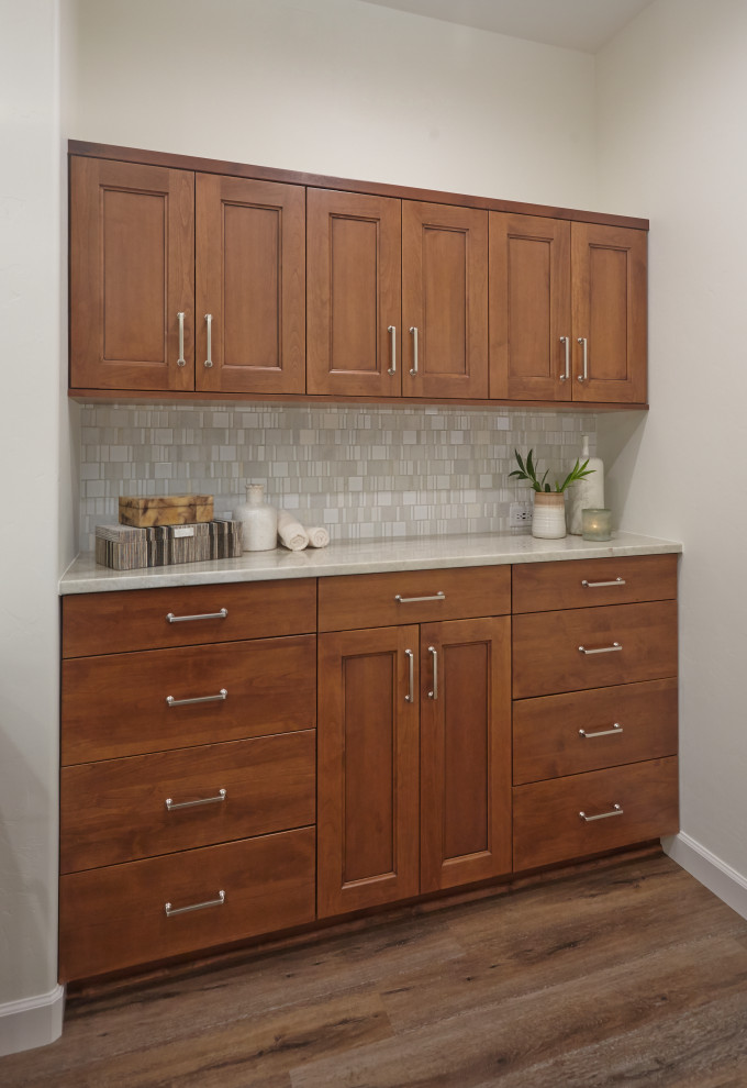 Example of a transitional home design design in Phoenix