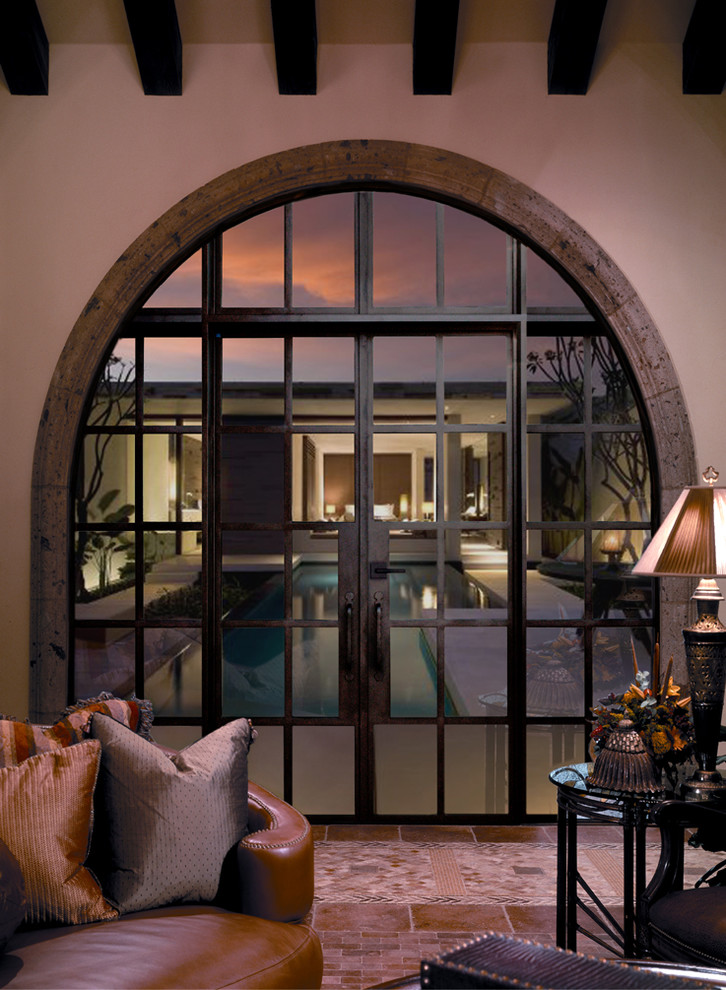 Example of a mid-sized trendy marble floor front door design in Austin with beige walls and a brown front door