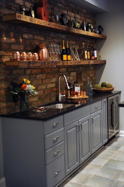 Design ideas for an industrial kitchen in Baltimore with an undermount sink, grey cabinets, granite benchtops, brick splashback, stainless steel appliances and ceramic floors.