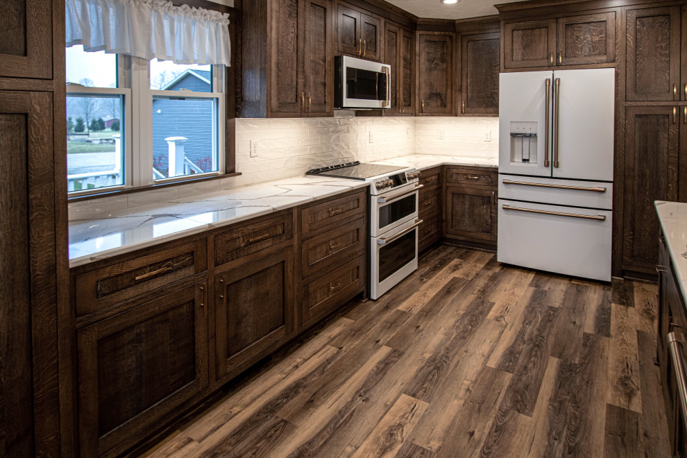 New Cambria Queensbury Countertops, Gloss Tile Backsplash and LVT