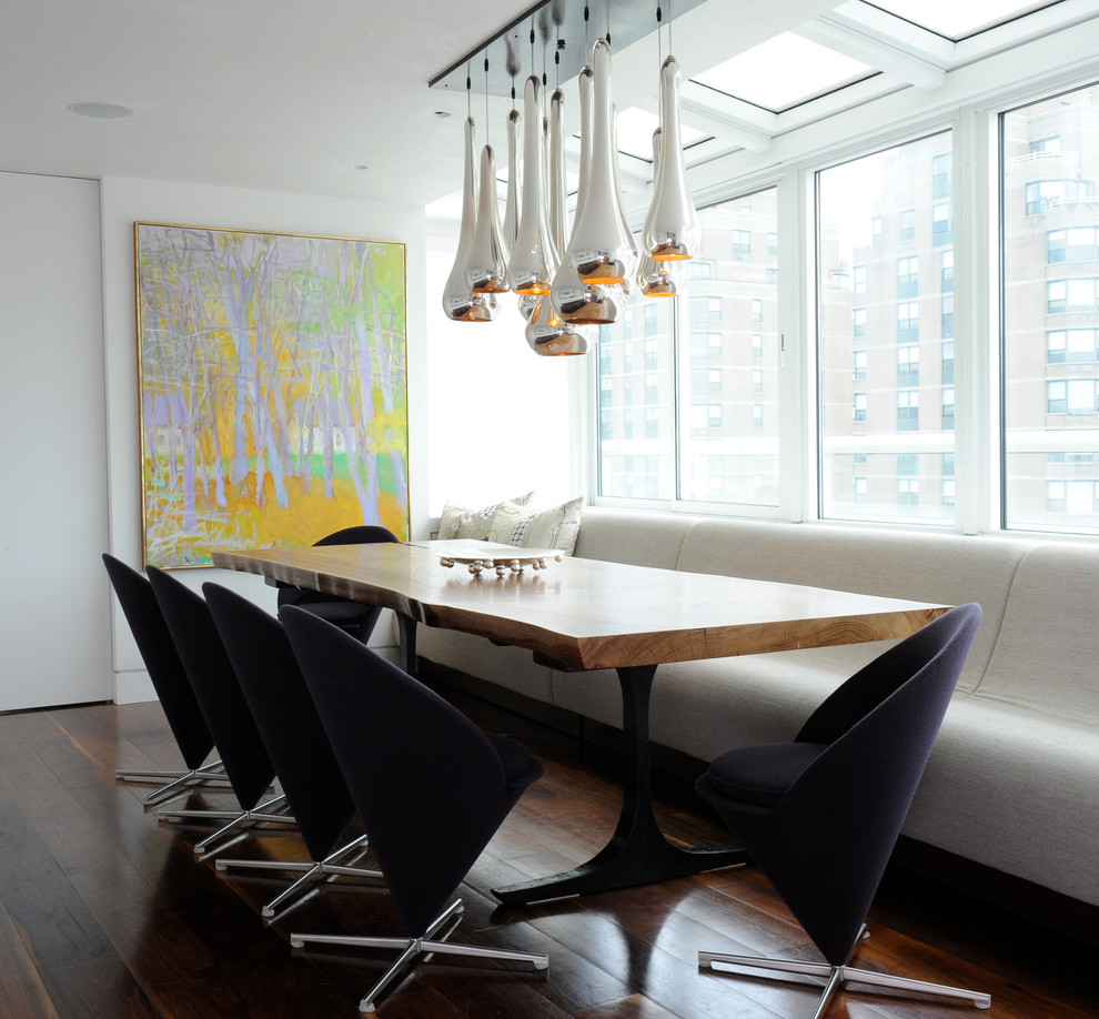 Inspiration for a modern dining room in Other with white walls and dark hardwood floors.