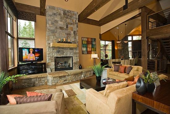 Design ideas for an expansive transitional open concept living room in Denver with medium hardwood floors, a standard fireplace and a stone fireplace surround.