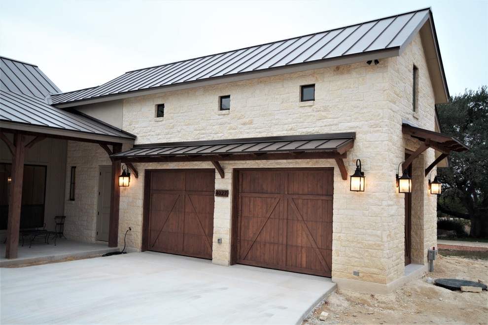 This is an example of a mid-sized traditional attached two-car carport in Austin.