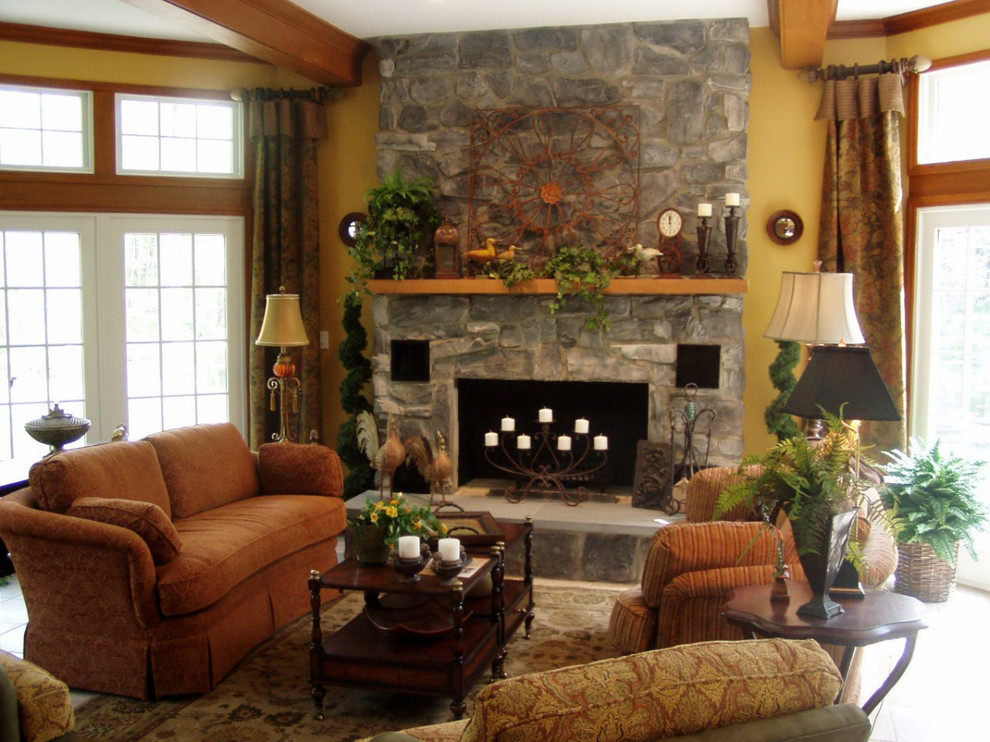 Inspiration for a mid-sized country formal open concept living room in New York with yellow walls, dark hardwood floors, a standard fireplace, a stone fireplace surround, no tv and brown floor.