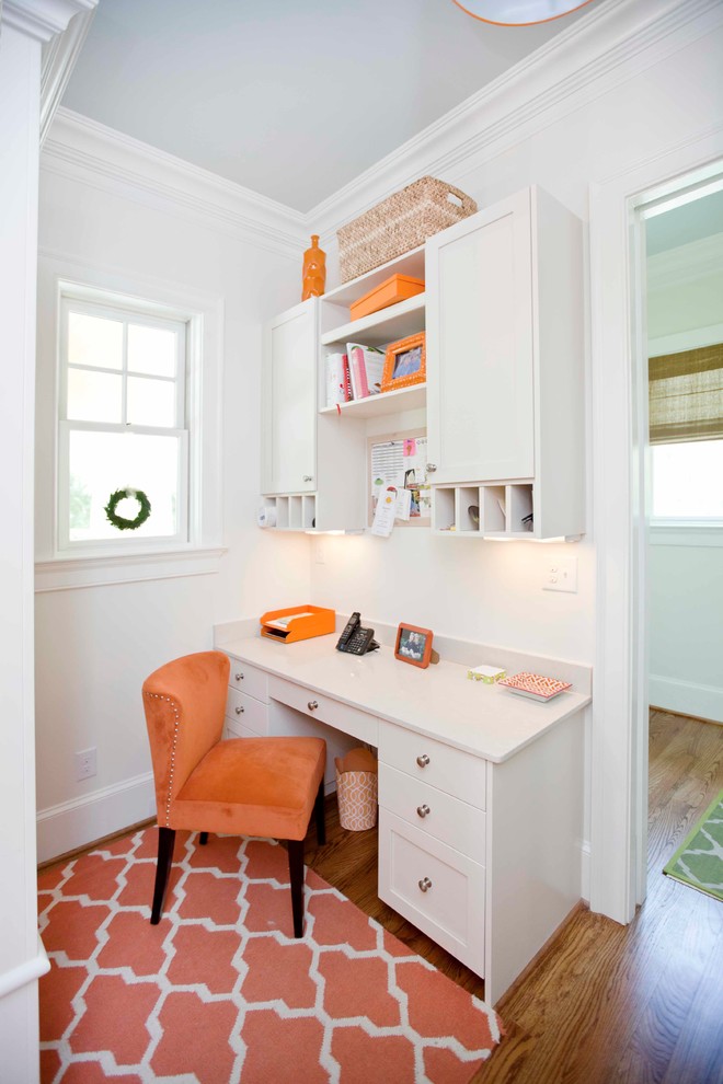 Home office - traditional home office idea in Charlotte with white walls