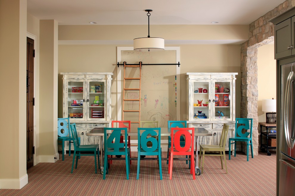 This is an example of a large beach style gender-neutral kids' playroom for kids 4-10 years old in Grand Rapids with beige walls and carpet.